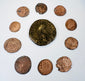 Ancient Roman Imperial coin collection with one large bronze coin and nine smaller Late Roman issues displaying portraits and reverse designs.