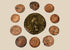 Collection of 10 ancient Roman bronze and copper-alloy coins, circa 3rd–4th century CE, with varied imperial portraits and aged patina.