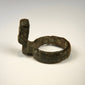Ancient Roman locking ring key with compact bronze construction and recognizable toothed key terminal