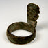 Roman bronze key ring with short projecting shaft, multiple teeth, and mineral surface deposits
