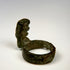Roman bronze personal ring key with substantial finger hoop, earthen encrustation, and aged surface wear