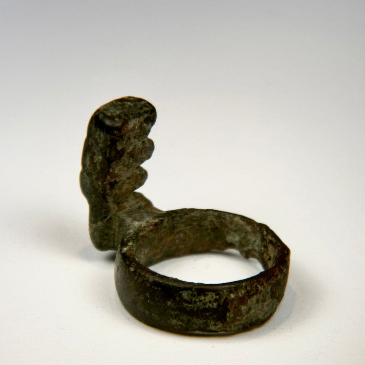 Roman bronze personal ring key with substantial finger hoop, earthen encrustation, and aged surface wear