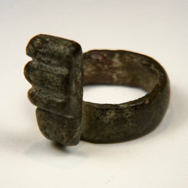 Roman bronze finger ring key with stepped teeth and dark green-brown archaeological patina