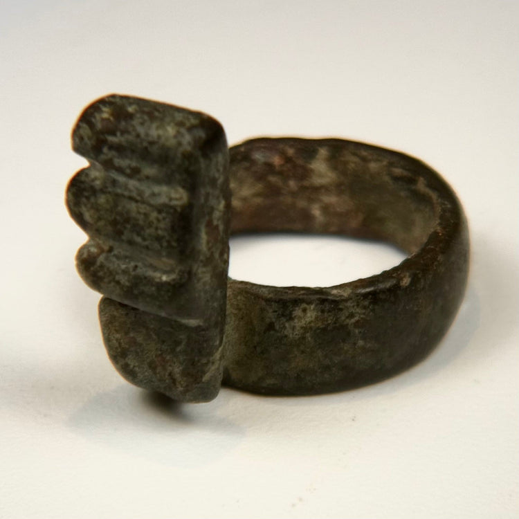 Roman bronze finger ring key with stepped teeth and dark green-brown archaeological patina