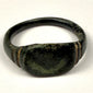 Ancient Roman bronze broad-bezel ring, circa 2nd–3rd century CE, with paired grooves and dark aged patina