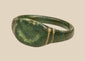 Ancient Roman bronze finger ring with broad oval bezel and dark green archaeological patina, circa 2nd–3rd century CE