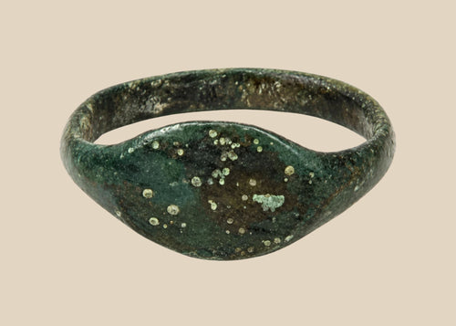 Ancient Roman bronze finger ring with broad plain oval bezel, circa 2nd–4th century CE
