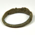 Close-up of Roman bronze ring bezel with surviving incised linear palm motif and surface oxidation