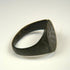 Roman bronze ring displaying ring-and-dot symbols traditionally associated with solar imagery