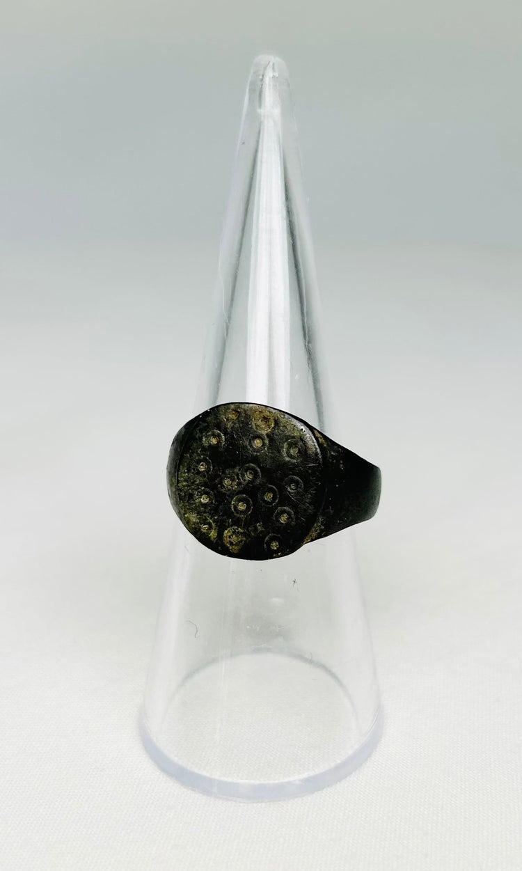 Ancient Roman bronze ring photographed to show natural patina and historical wear