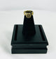 Top-down shot of Roman bronze ring emphasizing circular bezel alignment and craftsmanship.