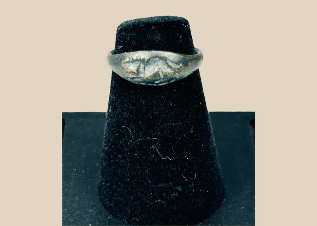 Ancient Roman bronze ring with raised mouse motif bezel and archaeological patina