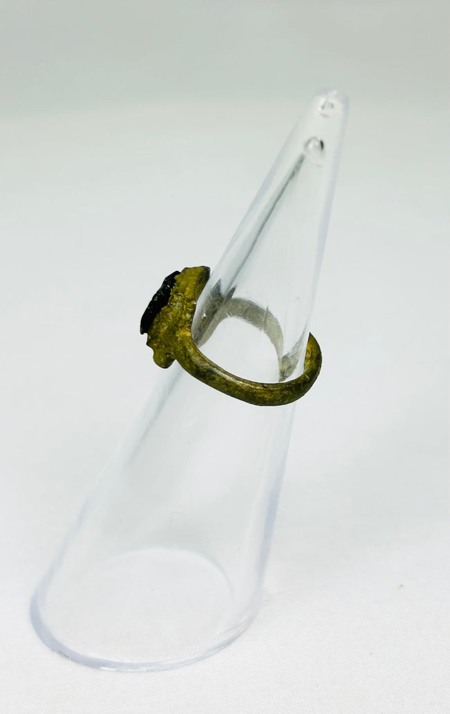 Roman Imperial bronze ring with deep patina and inset carved red glass intaglio