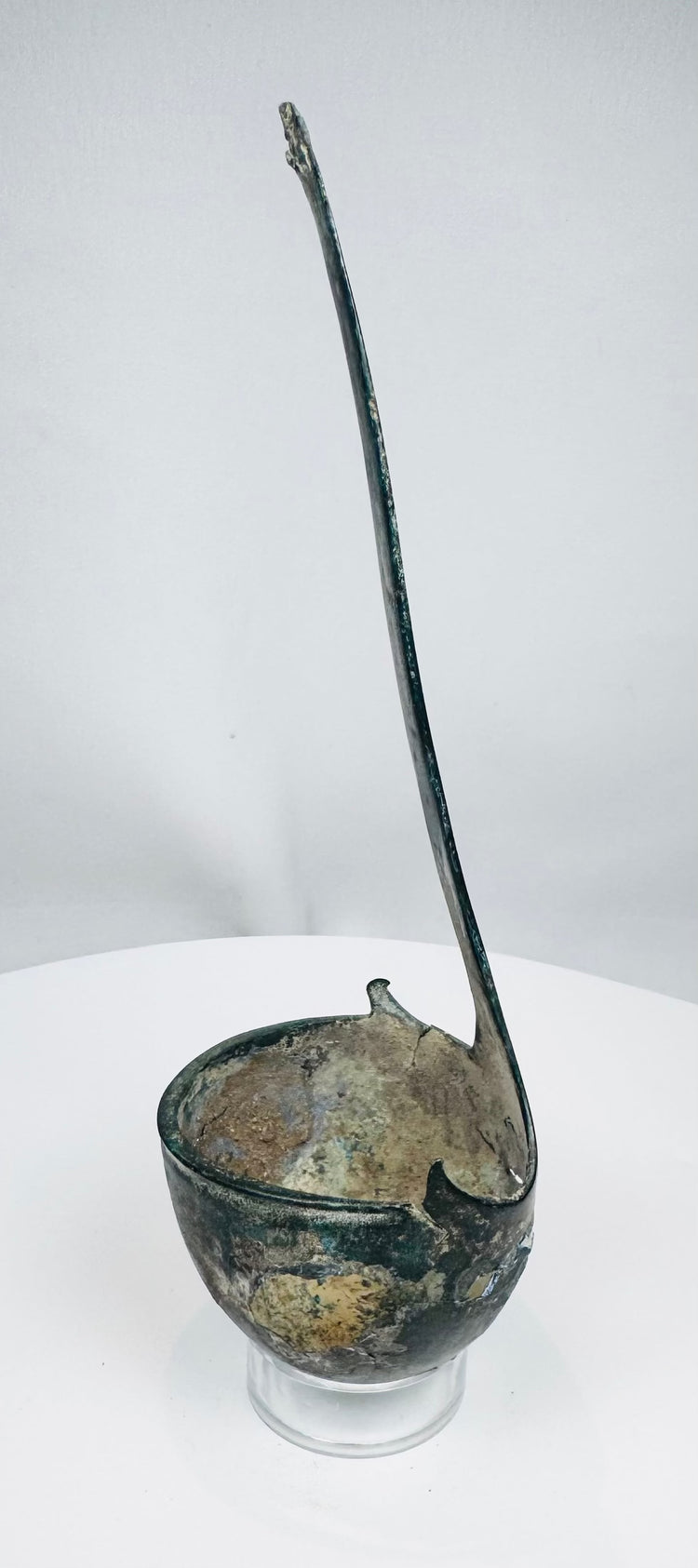 Ancient Roman ritual or serving ladle with hemispherical bowl and flat handle