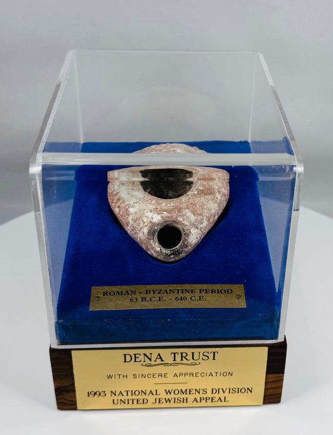 Ancient terracotta oil lamp from the Eastern Mediterranean mounted in a velvet-lined case