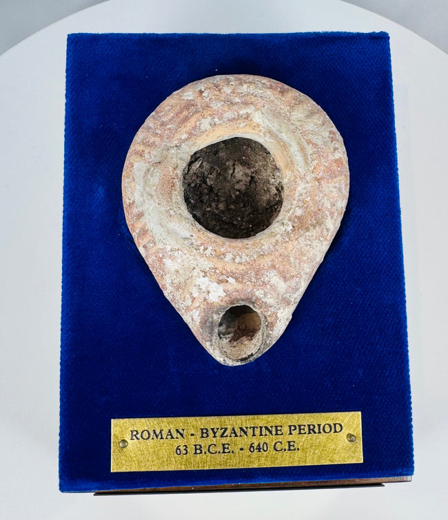 Terracotta oil lamp used for illumination during the Roman and Byzantine periods