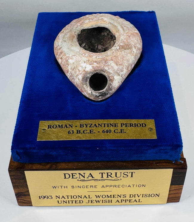 Display-mounted ancient oil lamp from the Byzantine Empire with presentation plaque