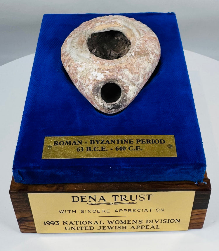 Display-mounted ancient oil lamp from the Byzantine Empire with presentation plaque