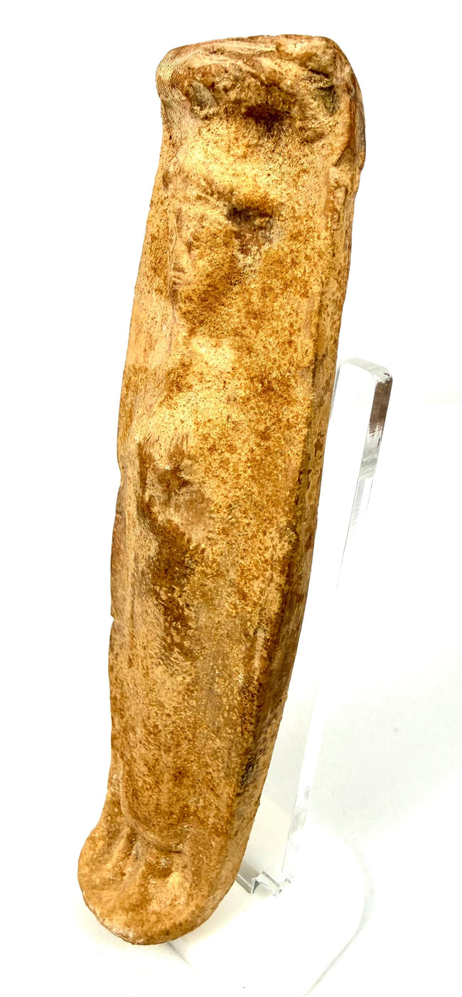 Three-quarter view of Roman terracotta fertility statue revealing chest contours and tapered feet