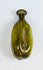 Ancient hand-blown Roman glass flask with fluted body and naturally weathered olive green surface
