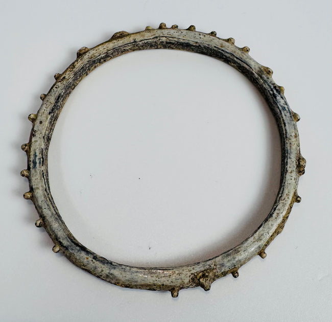 Ancient Roman bracelet crafted using traditional glassworking techniques and applied ornamentation.