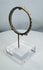 Roman Empire glass bracelet featuring circular form and applied nodular decoration.