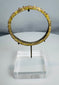 Authentic Roman glass bracelet featuring raised nodular ornamentation and archaeological patina.