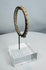 Ancient Roman personal adornment crafted from glass with applied decorative nodules.