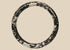 Ancient Roman dark glass bracelet with heavy iridescent burial weathering, circa 2nd–4th century CE