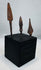 Side view of three archaeological iron arrow, javelin, or light spear points