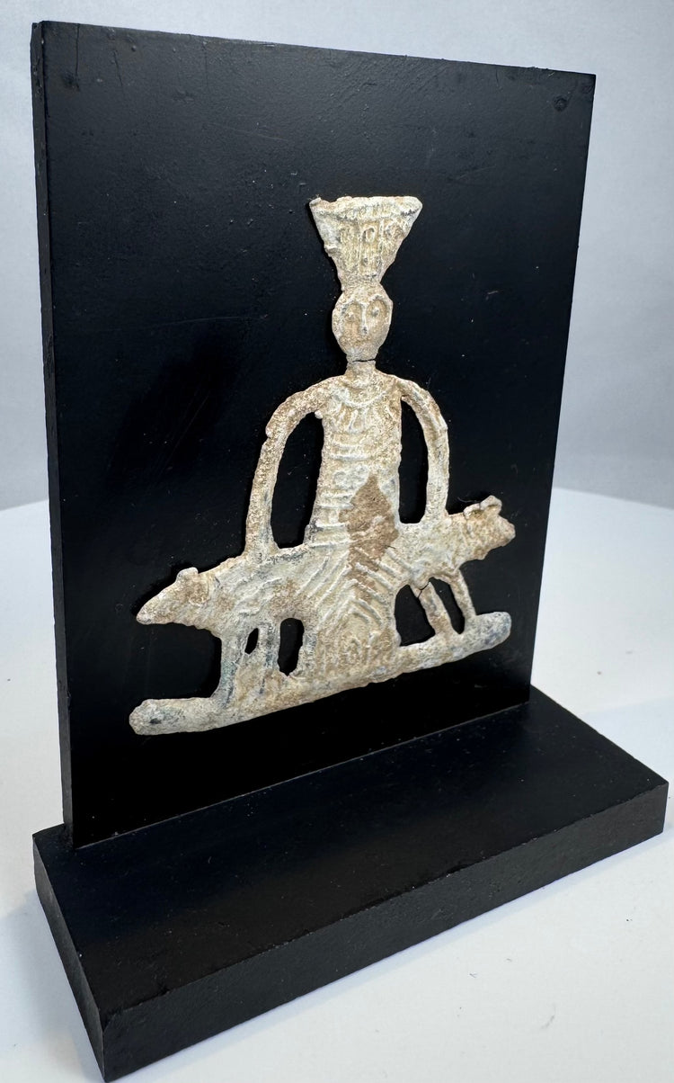 Ancient lead-alloy devotional plaque with ependytes garment and geometric pedestal motif
