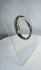 Authentic Roman mosaic glass bracelet featuring multicolored bands of green, yellow, white, blue, and black glass.