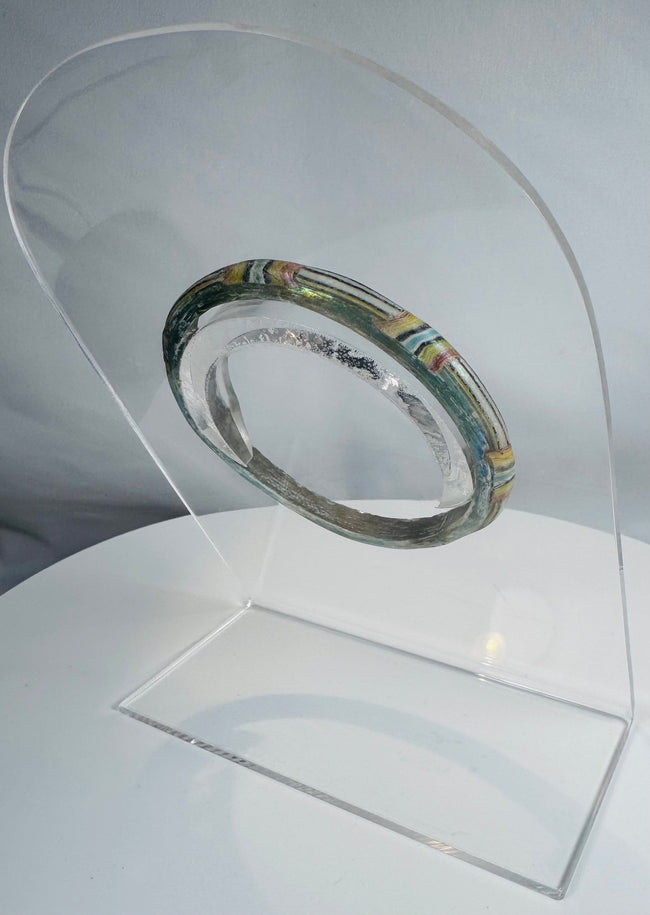 Ancient Roman glass bracelet showcasing advanced mosaic glassworking techniques and decorative craftsmanship.