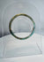 Roman Imperial mosaic glass bracelet preserved in a complete circular form with vibrant multicolored pattern.