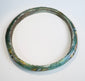Collector-quality Roman mosaic glass bracelet with preserved multicolored design and archaeological character.