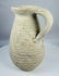 Ancient Tunisian terracotta vessel dating to the Roman Imperial period with a sturdy loop handle.