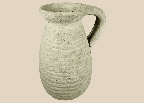 Ancient Roman North African terracotta pitcher from modern Tunisia with ribbed body and loop handle.