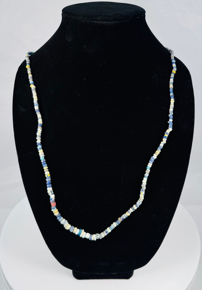 Restrung Roman glass necklace with annular, barrel-shaped, and cylindrical beads