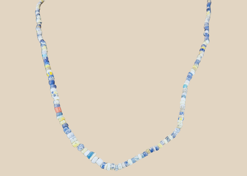 Ancient Roman polychrome glass bead necklace with blue, turquoise, amber, and cream beads