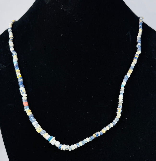 Restrung Roman bead necklace with translucent, opaque, and semi-translucent glass