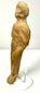 Rear view of antique terracotta figurine highlighting striated hair texture and shoulder contours