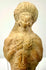 Close-up of ancient Roman terracotta bust featuring high bun hairstyle and decorated abdomen