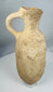 Authentic Roman terracotta storage vessel with a rounded body, loop handle, and weathered archaeological surface.