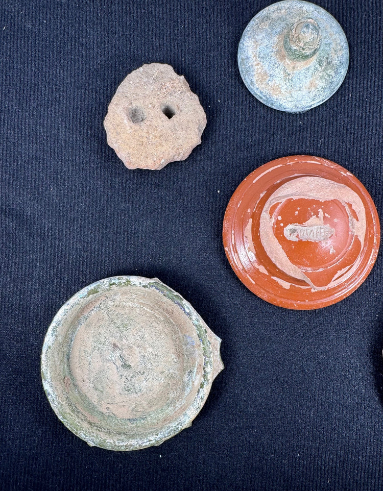 Roman terra sigillata fragments with maker’s stamp and incised ownership graffito