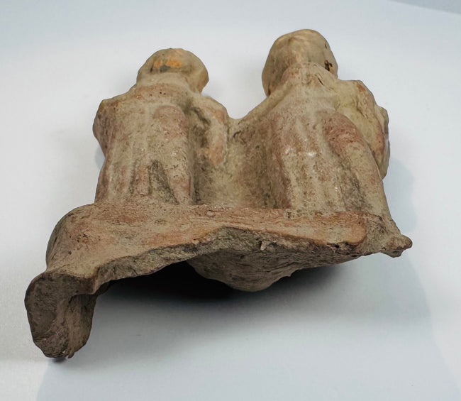 Side view of an authentic ancient Greek terracotta votive group from Magna Graecia with hand-modeled details.