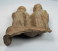 Side view of an authentic ancient Greek terracotta votive group from Magna Graecia with hand-modeled details.