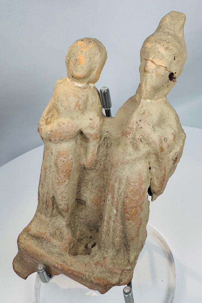 Greek Colonial Period terracotta votive sculpture from ancient Sicily with surviving paired human figures.
