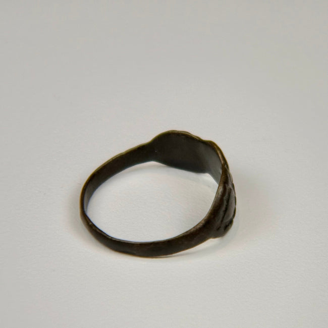 Early Byzantine silver ring with three oval motifs arranged in a symmetrical decorative pattern