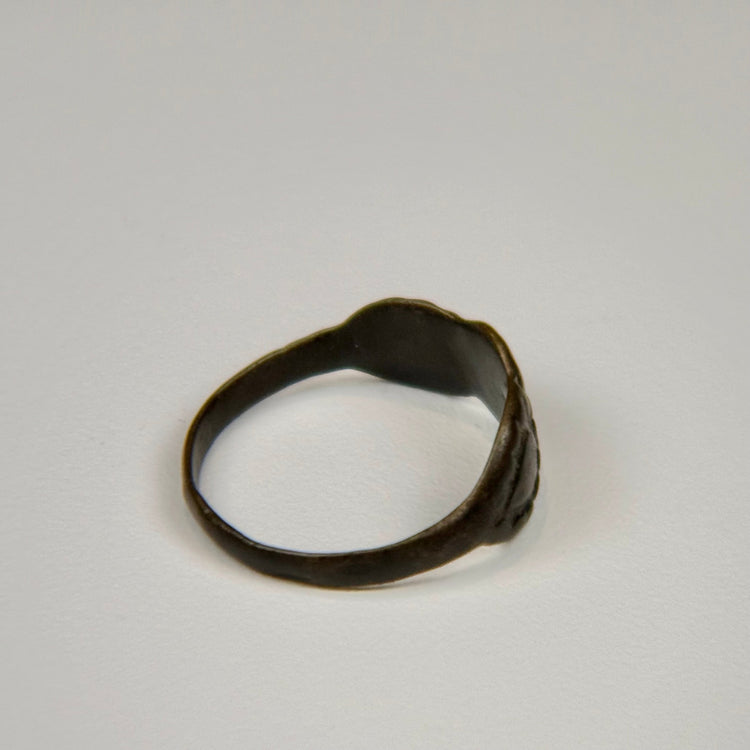 Early Byzantine silver ring with three oval motifs arranged in a symmetrical decorative pattern