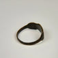 Ancient silver finger ring showing a weathered clustered bezel and centuries-old natural patina